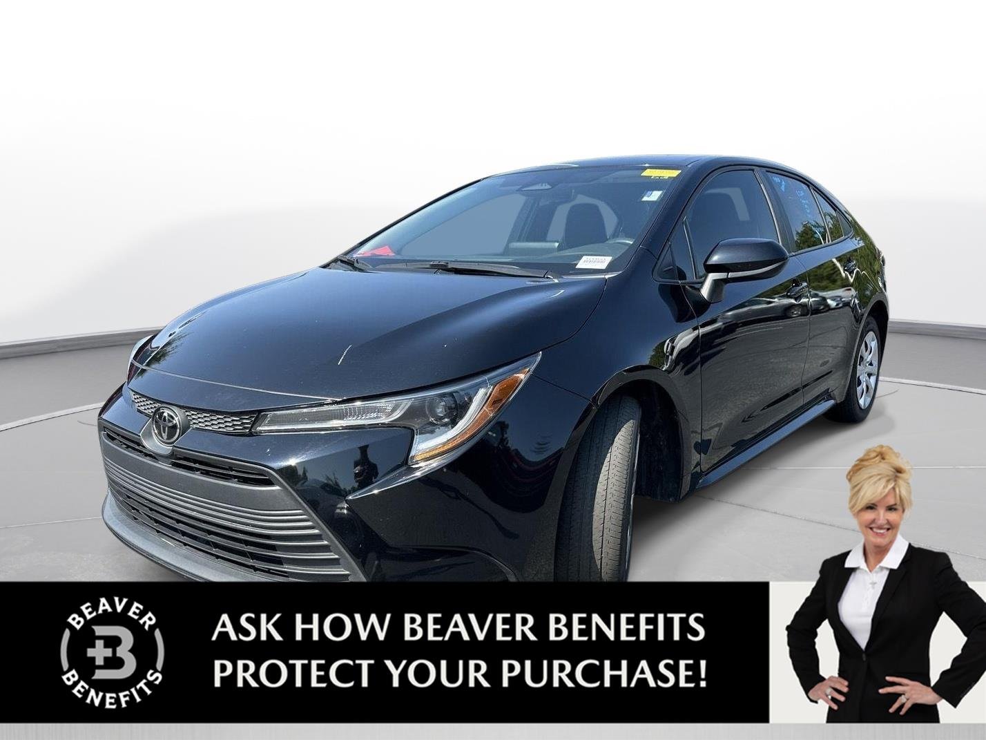 Used 2024 Midnight Black Metallic Toyota LE image 1