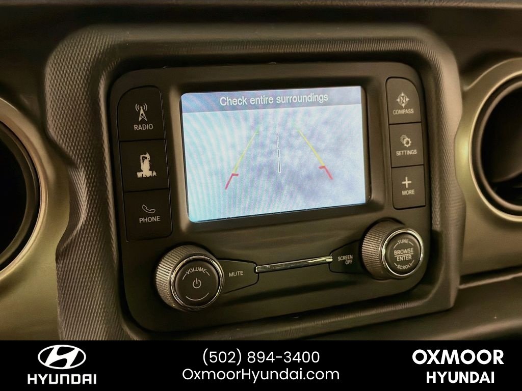 Used 2018 Granite Crystal Metallic Clearcoat Jeep Sport image 13