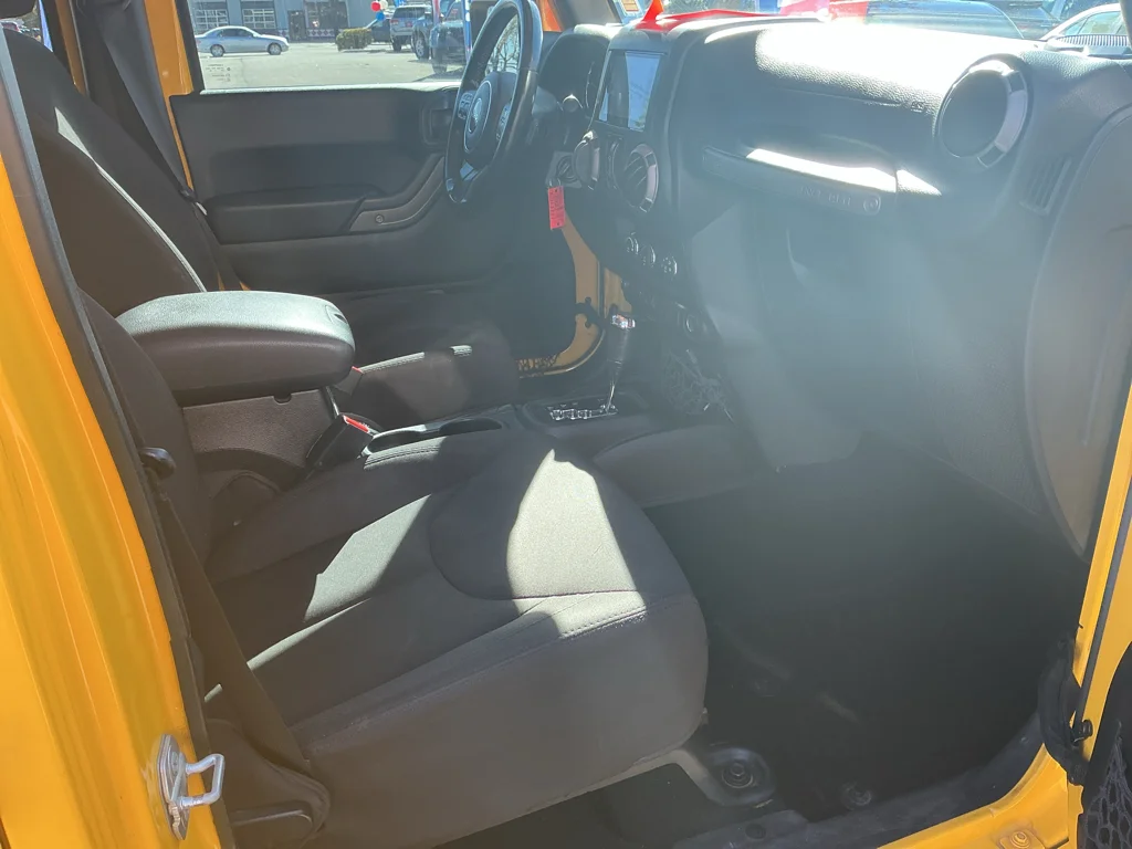 Used 2015 Baja Yellow Jeep Sport image 19
