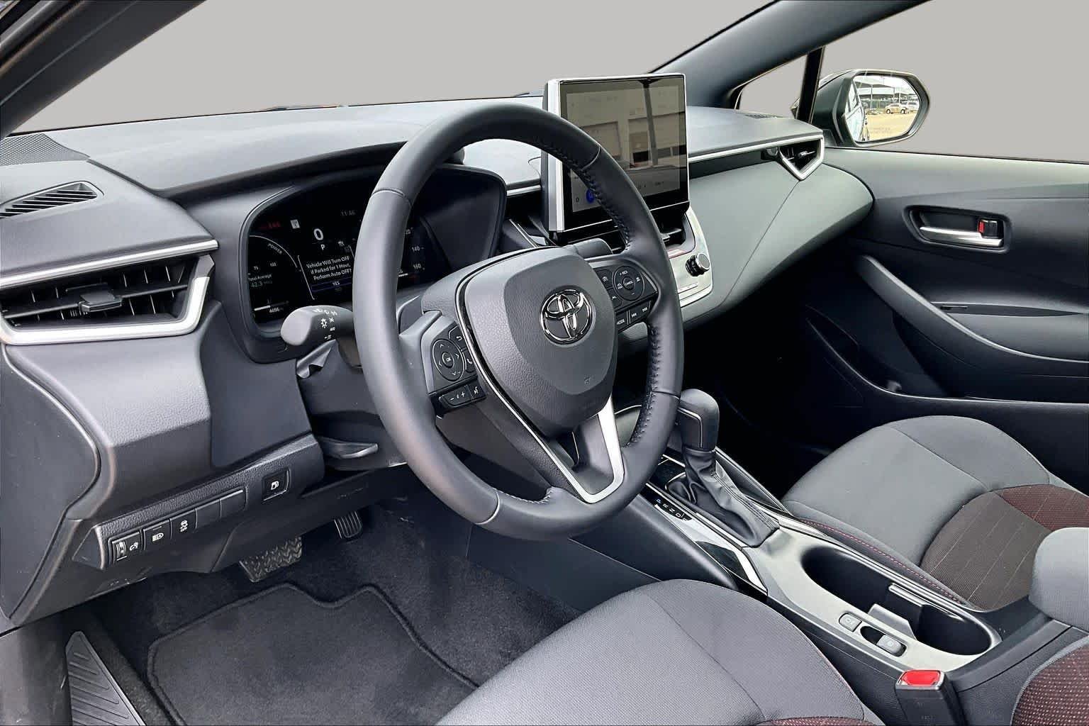 Used 2026 Midnight Black Metallic Toyota Hybrid SE image 16