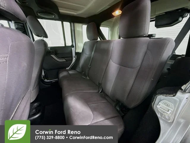 Used 2014 Billet Clearcoat Metallic Jeep Unlimited Sport image 21