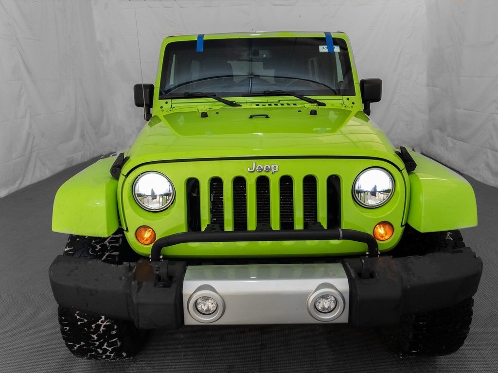 Used 2013 Jeep Wrangler Unlimited Sahara with VIN 1C4BJWEG5DL570272 for sale in Lansing, MI