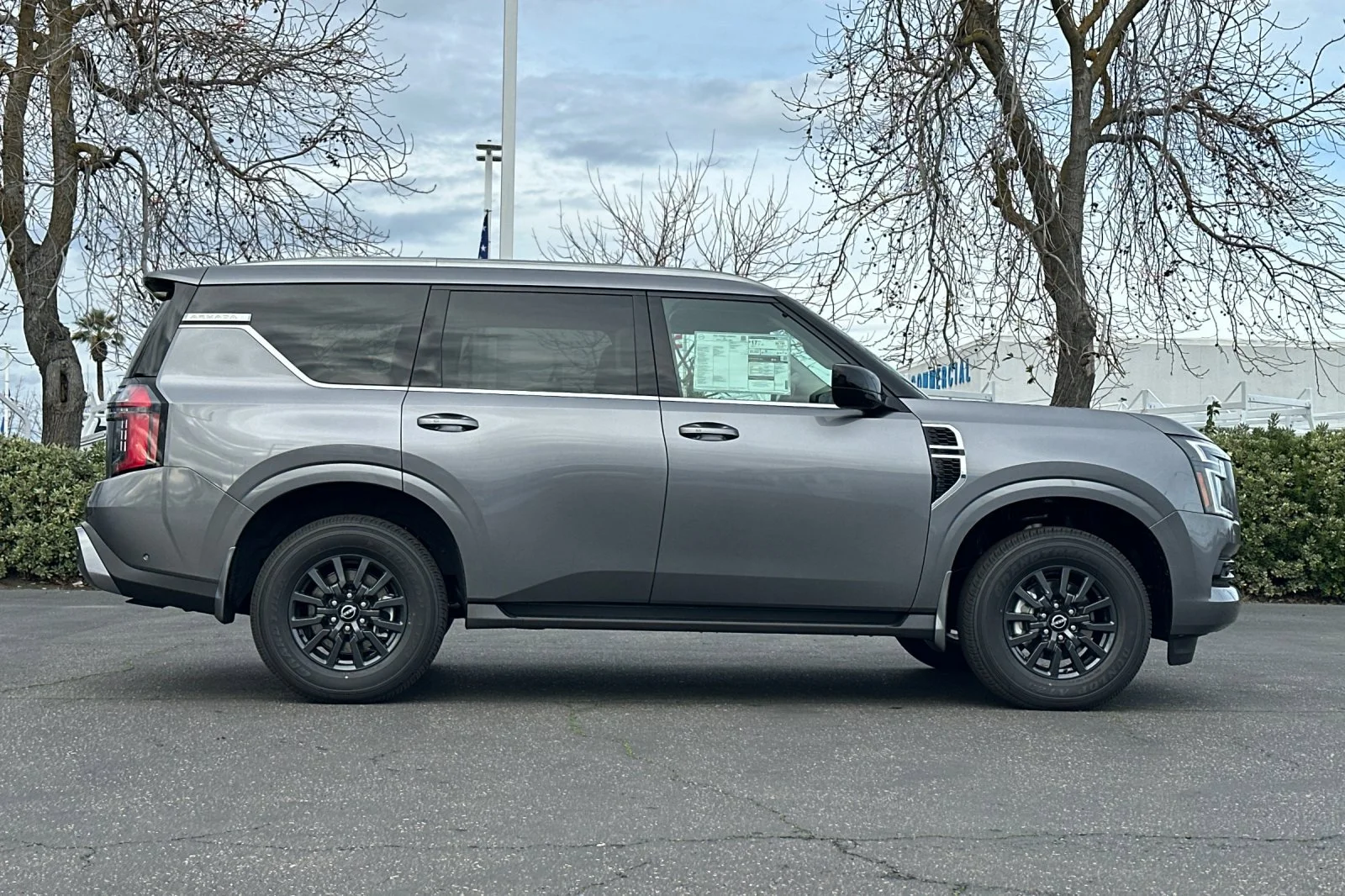 New 2026 Gun Metallic Nissan SV image 3