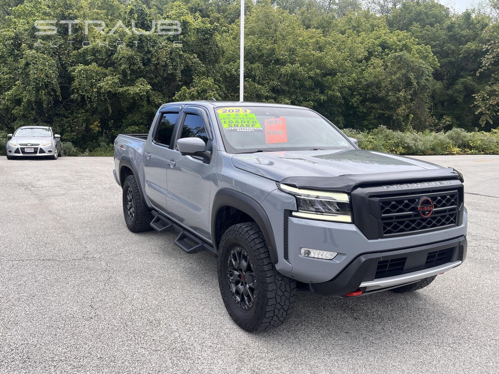Used 2023 Boulder Gray Pearl Nissan PRO-4X image 1