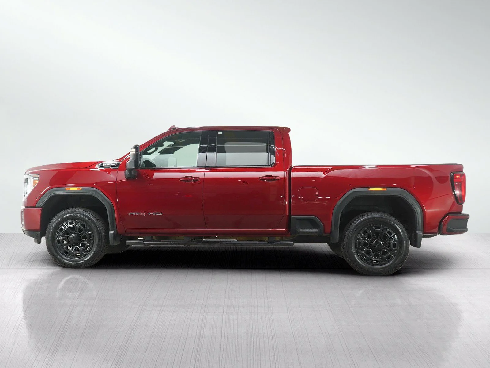 Used 2021 GMC Sierra 2500HD AT4 with VIN 1GT19PE73MF261702 for sale in Roseville, Minnesota