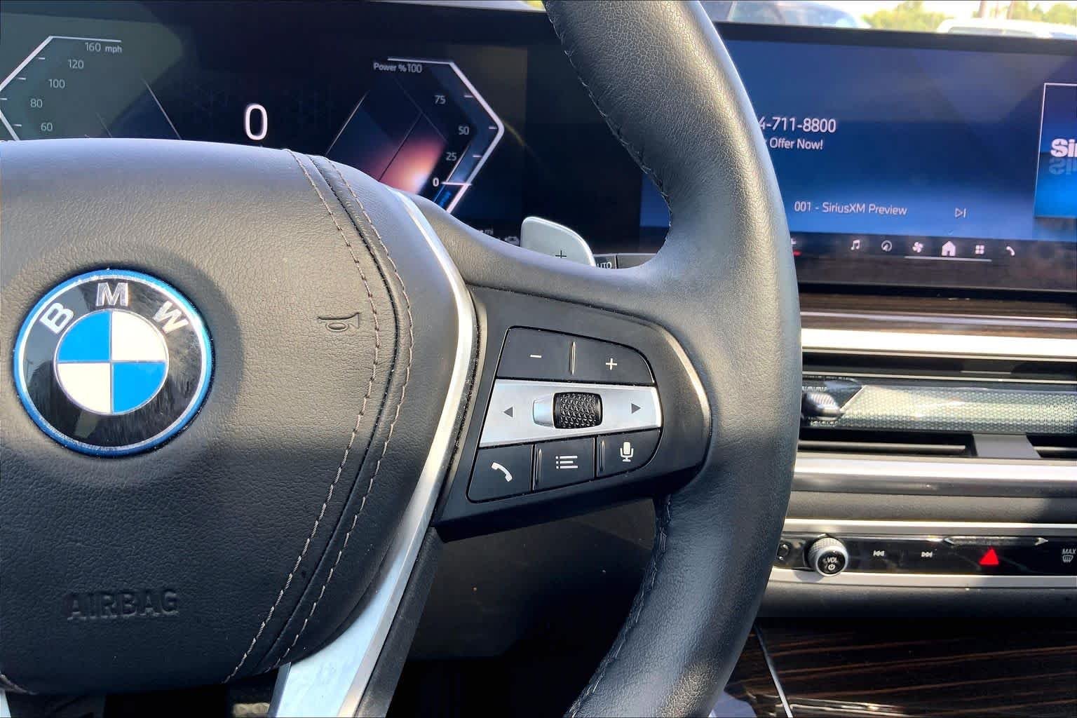 Used 2025 Black Sapphire Metallic BMW xDrive50e image 25