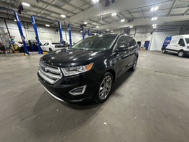 Used 2015 Tuxedo Black Metallic Ford Titanium image 1