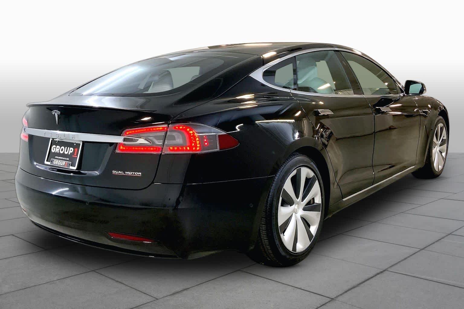 Used 2020 Solid Black Tesla Performance image 12
