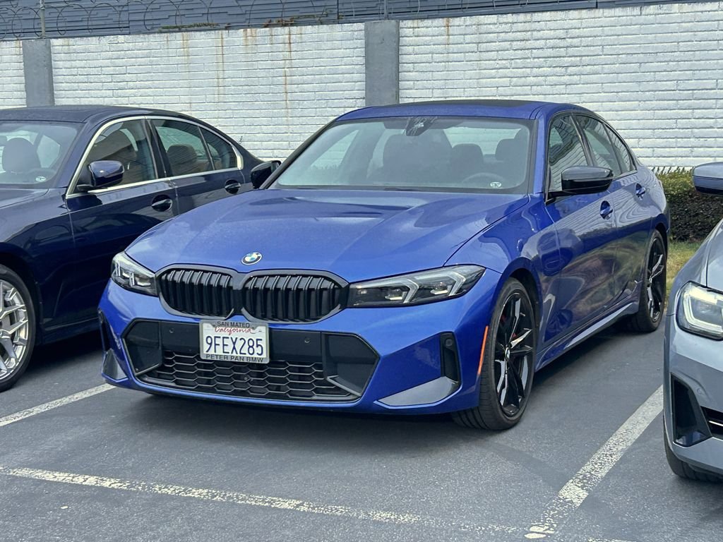 Certified Used 2023 Blue Metallic BMW 330i image 2