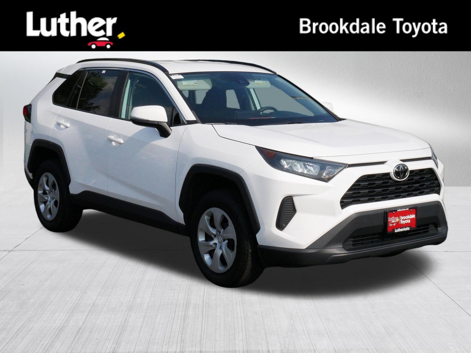 Used 2021 Super White Toyota LE image 1
