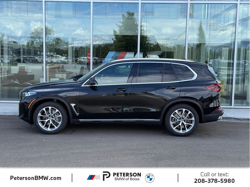 New 2026 Black Sapphire Metallic BMW xDrive50e image 2