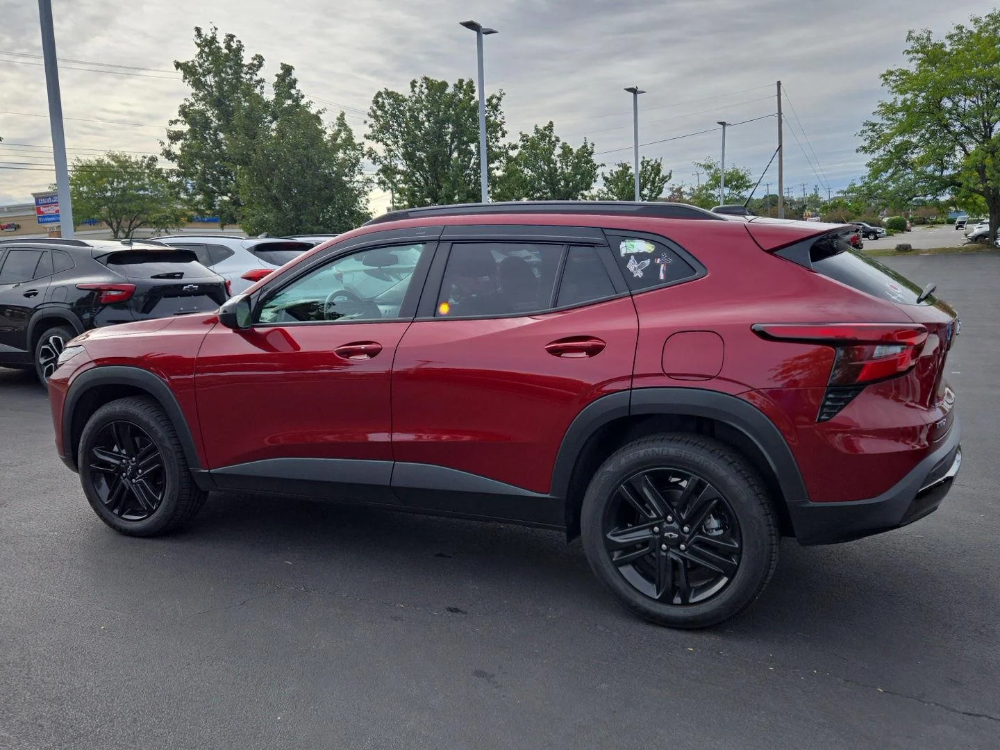 Used 2024 Crimson Metallic Chevrolet ACTIV image 3
