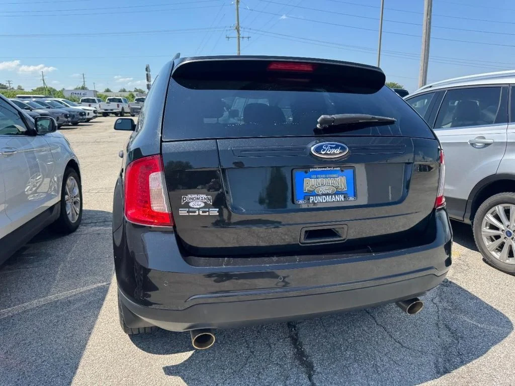 Used 2013 Tuxedo Black Metallic Ford SE image 7