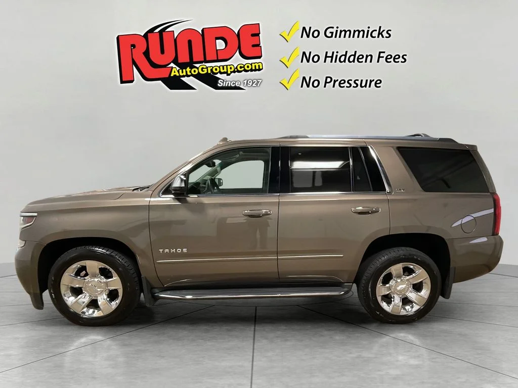 Used 2015 Chevrolet Tahoe LTZ with VIN 1GNSKCKC4FR743218 for sale in Manchester, IA
