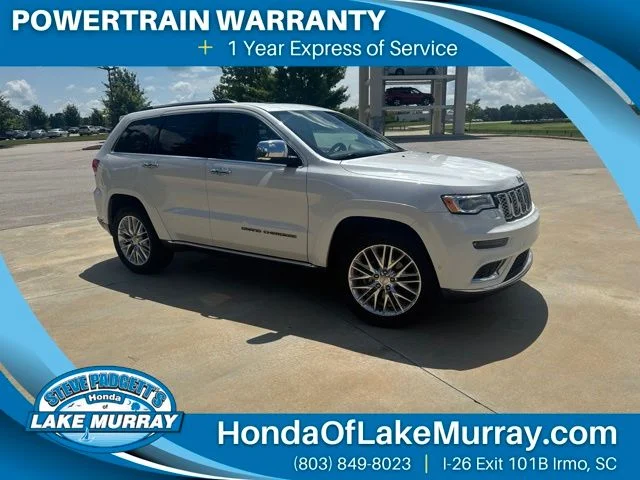Used 2018 Ivory Jeep Summit image 1