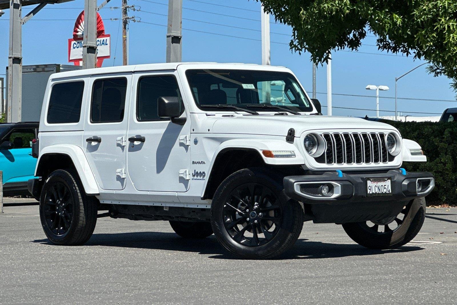 Used 2024 Bright White Clearcoat Jeep Sahara image 2