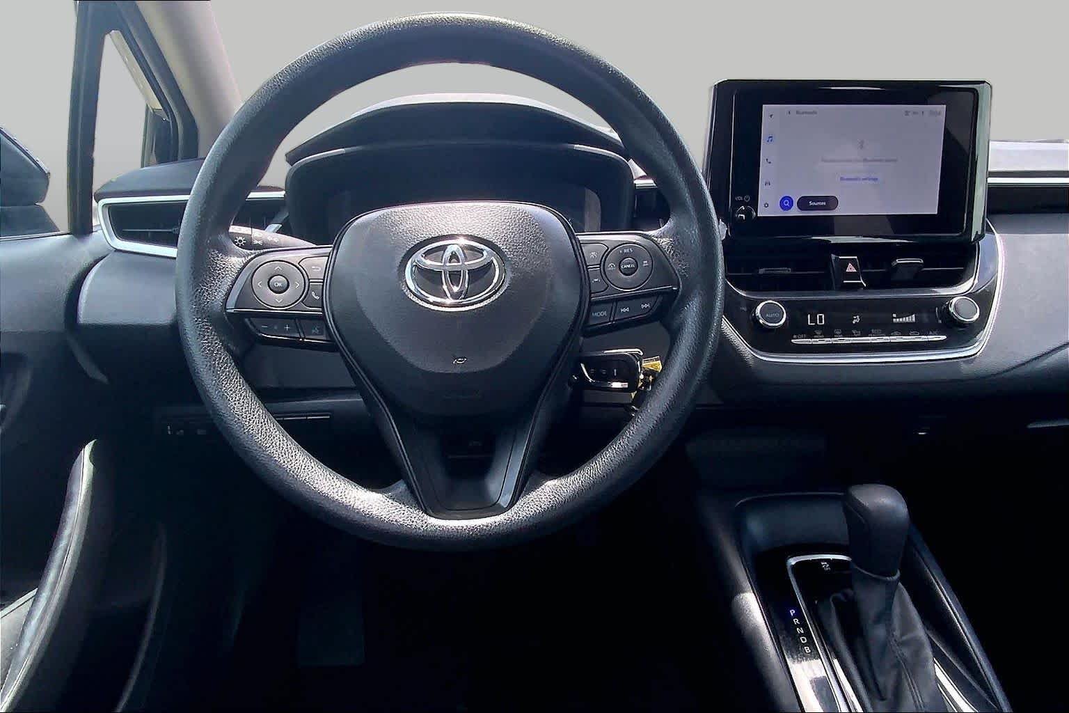 Used 2024 Midnight Black Metallic Toyota LE image 6