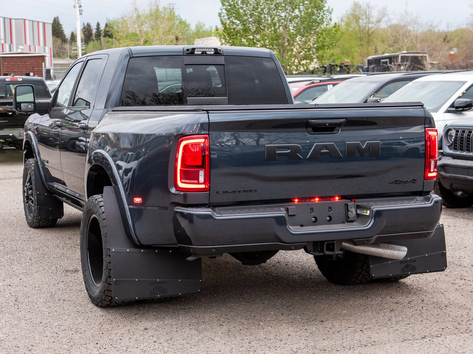 Used 2026 Blue RAM Limited* Mega Cab, 20 Inch Mayhem Wheels, Trigger Industries Mudflaps image 6
