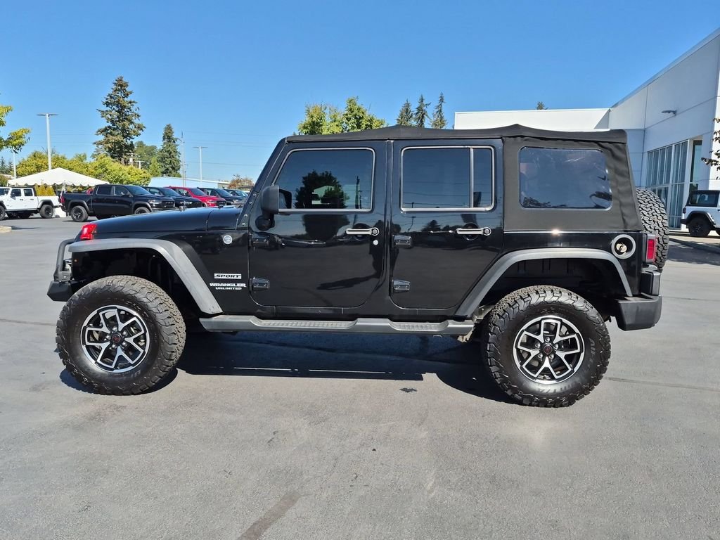 Used 2015 Black Clearcoat Jeep Unlimited Sport image 3