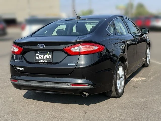 Used 2014 Tuxedo Black Metallic Ford SE image 13