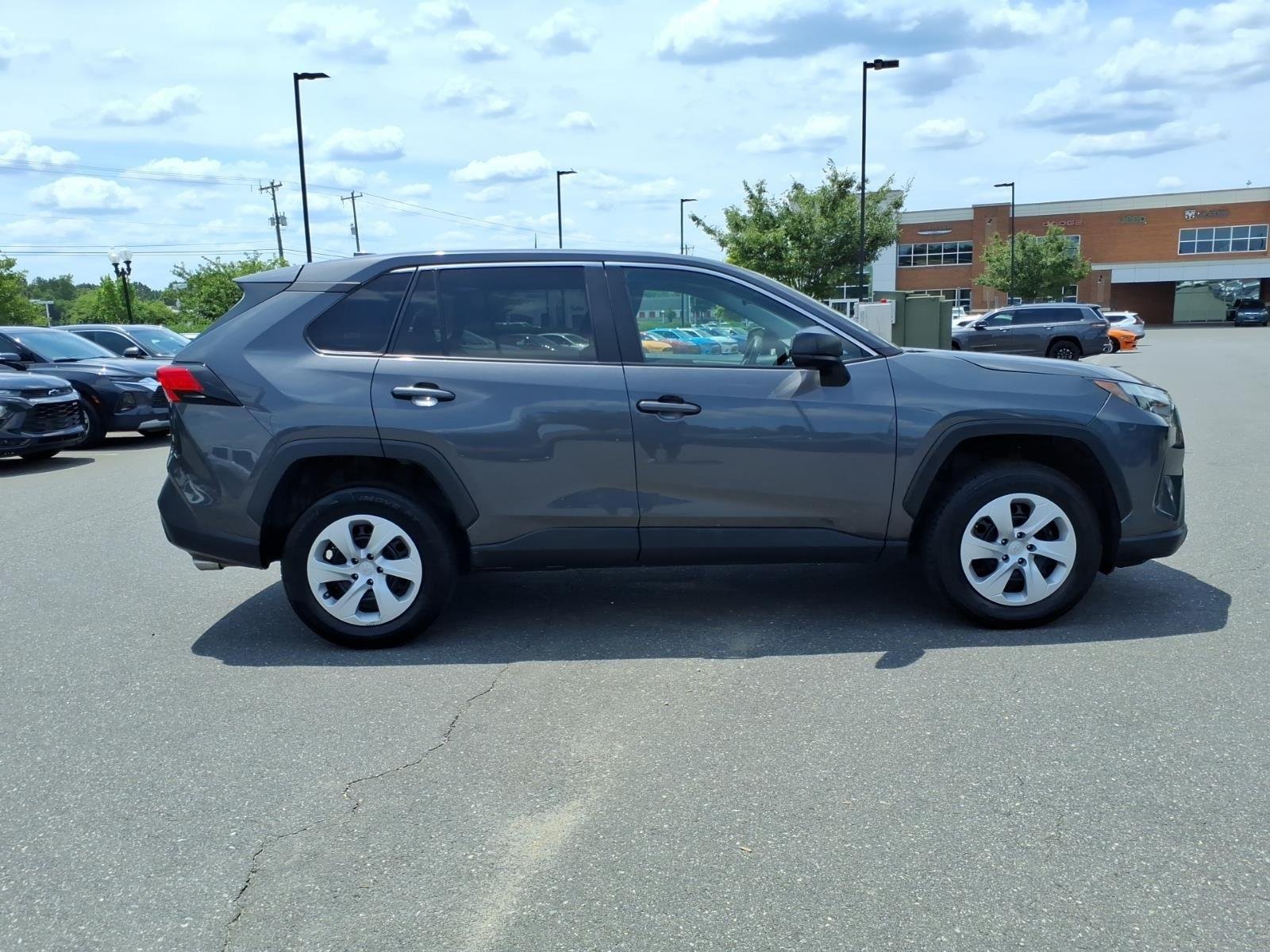 Used 2024 Magnetic Gray Metallic Toyota LE image 7