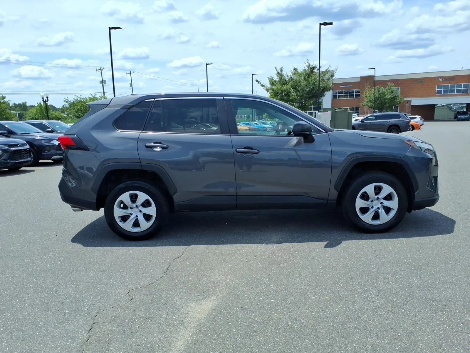Used 2024 Magnetic Gray Metallic Toyota LE image 7