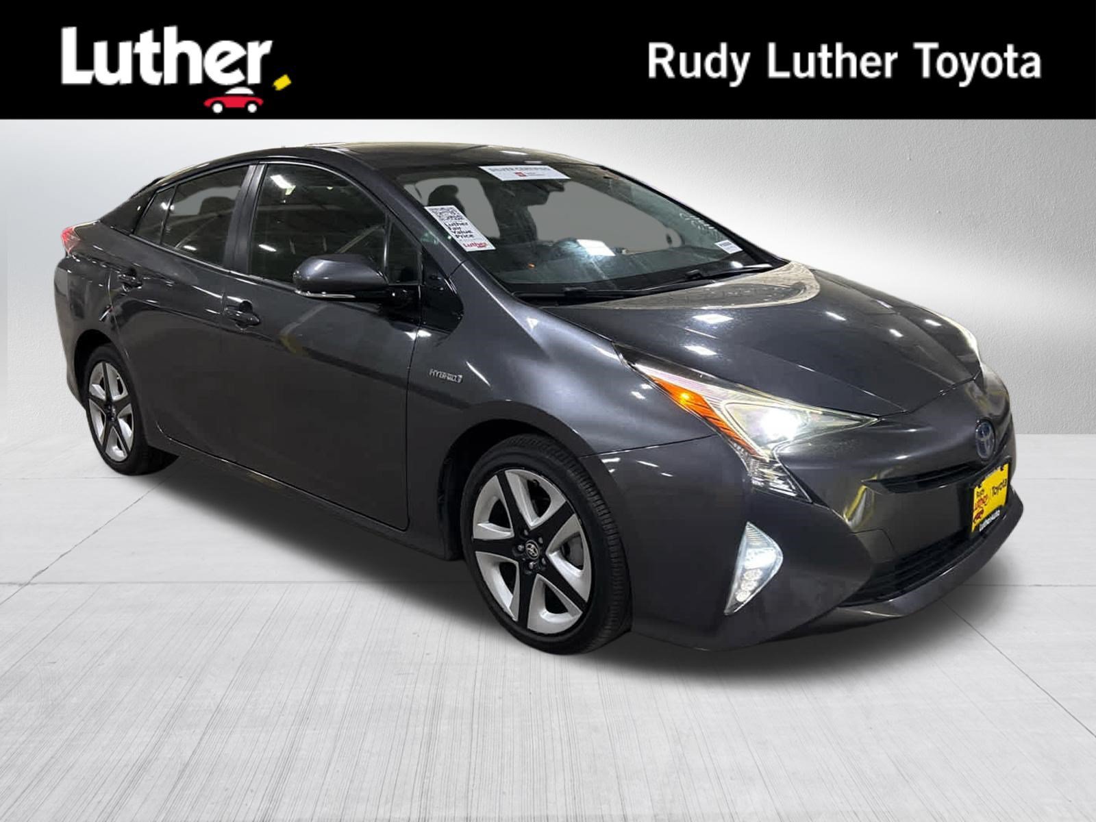 Used 2017 Magnetic Gray Metallic Toyota Three Touring image 1