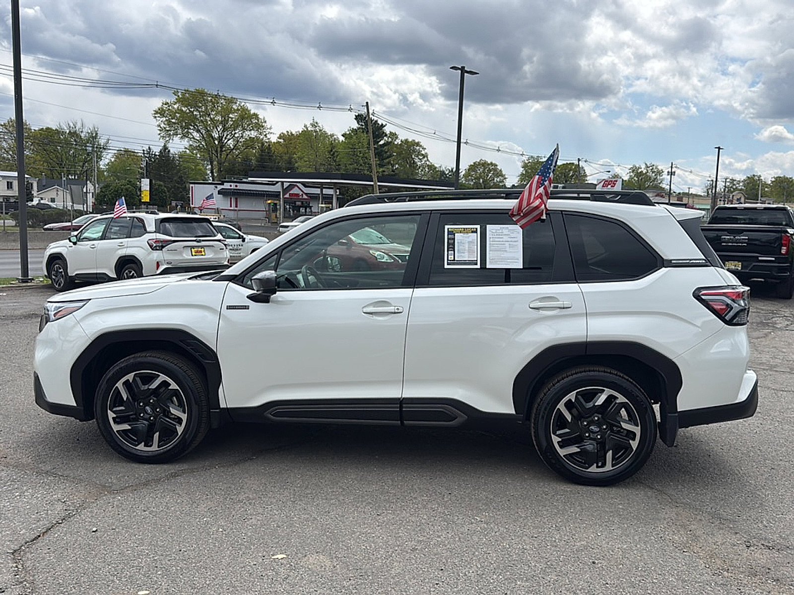 Used 2025 Crystal White Pearl Subaru Limited Hybrid image 8