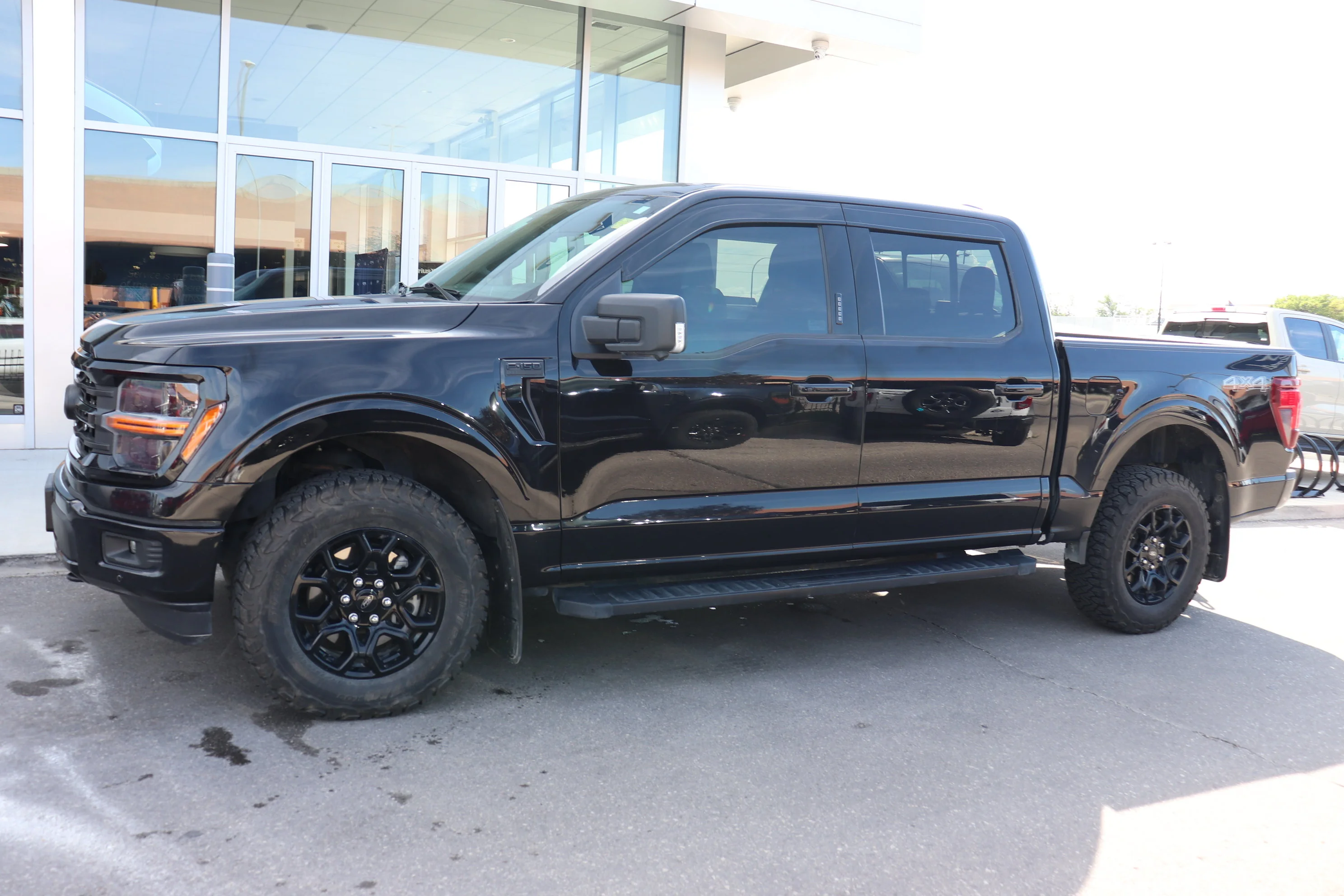Used 2024  Ford XLT 4WD SuperCrew 5.5