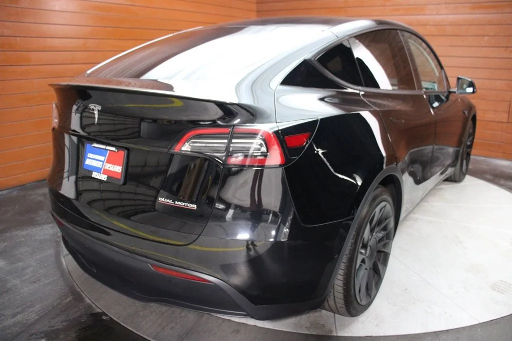 Used 2022 Solid Black Tesla Performance image 15