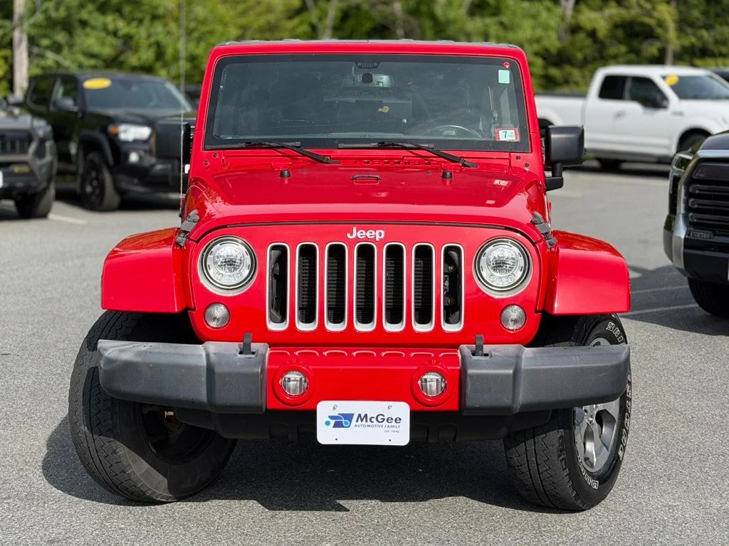 Used 2018 Red Jeep Unlimited Sahara image 2