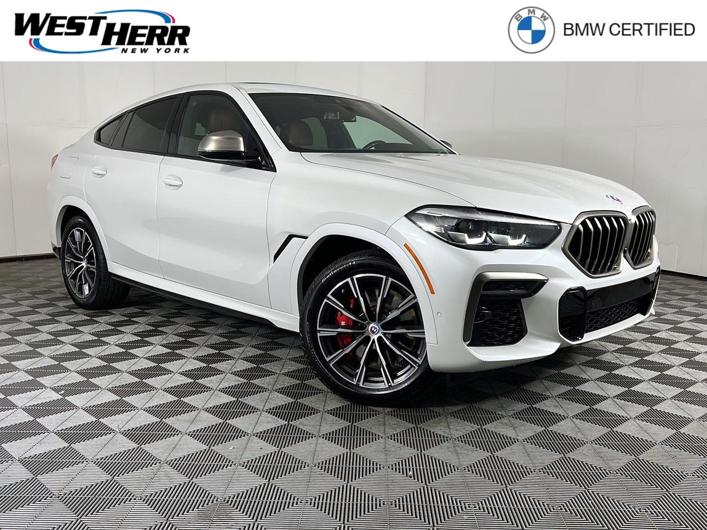Certified Used 2023 Mineral White Metallic BMW M50i image 1