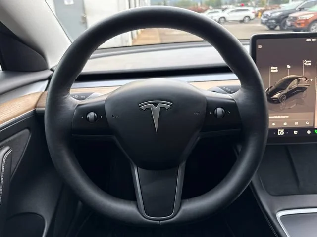Used 2023 Solid Black Tesla Base image 19