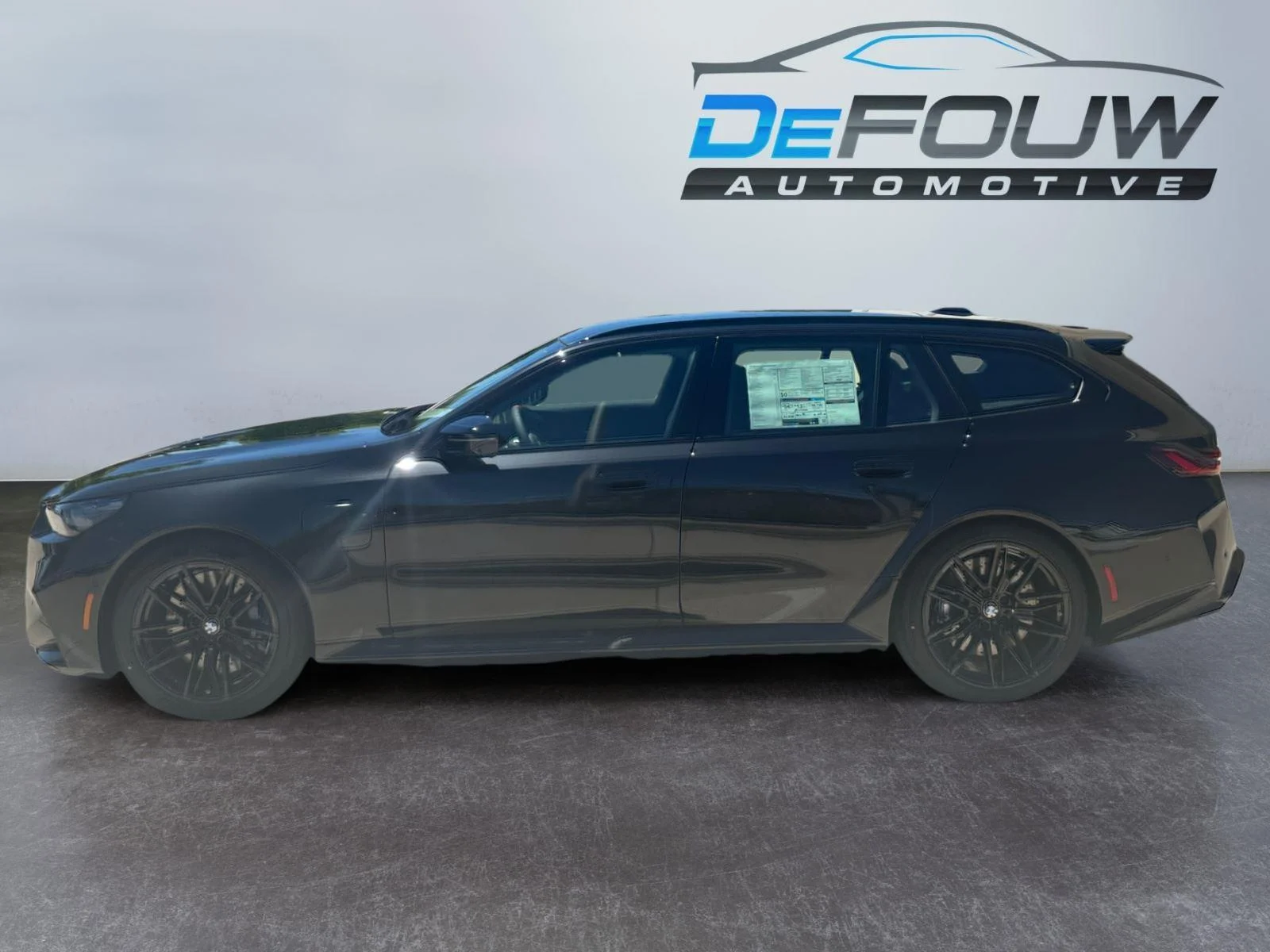 New 2027 Black Sapphire Metallic BMW TOURING image 6
