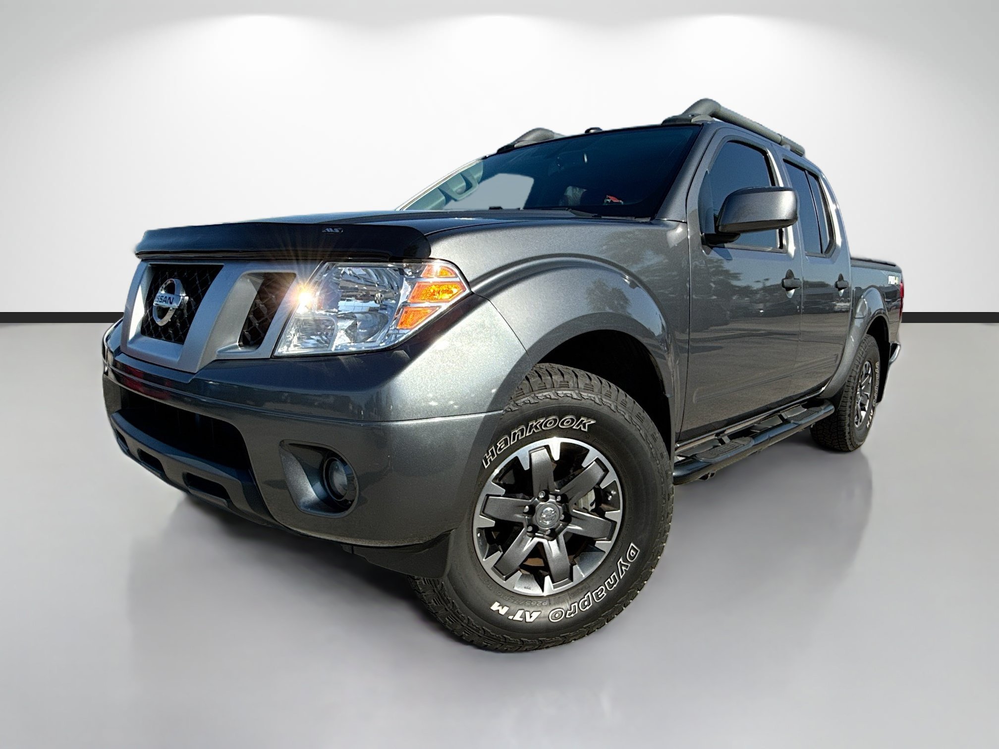 Used 2021 Gun Metallic Nissan PRO-4X image 1