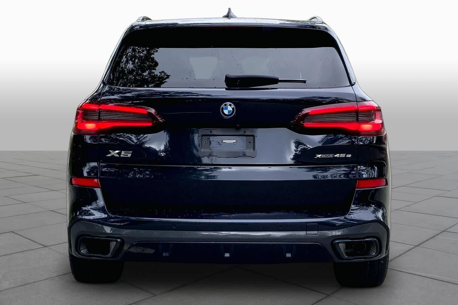 Used 2023 Carbon Black Metallic BMW xDrive45e image 4