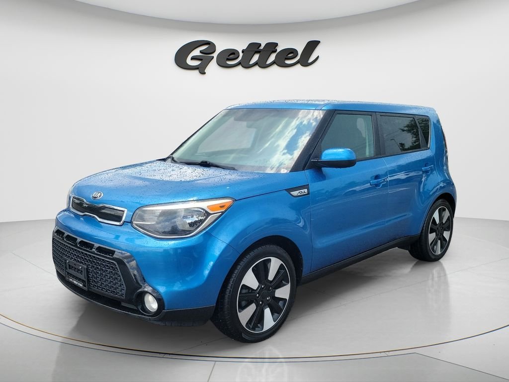 Used 2016 Blue Kia Plus image 1