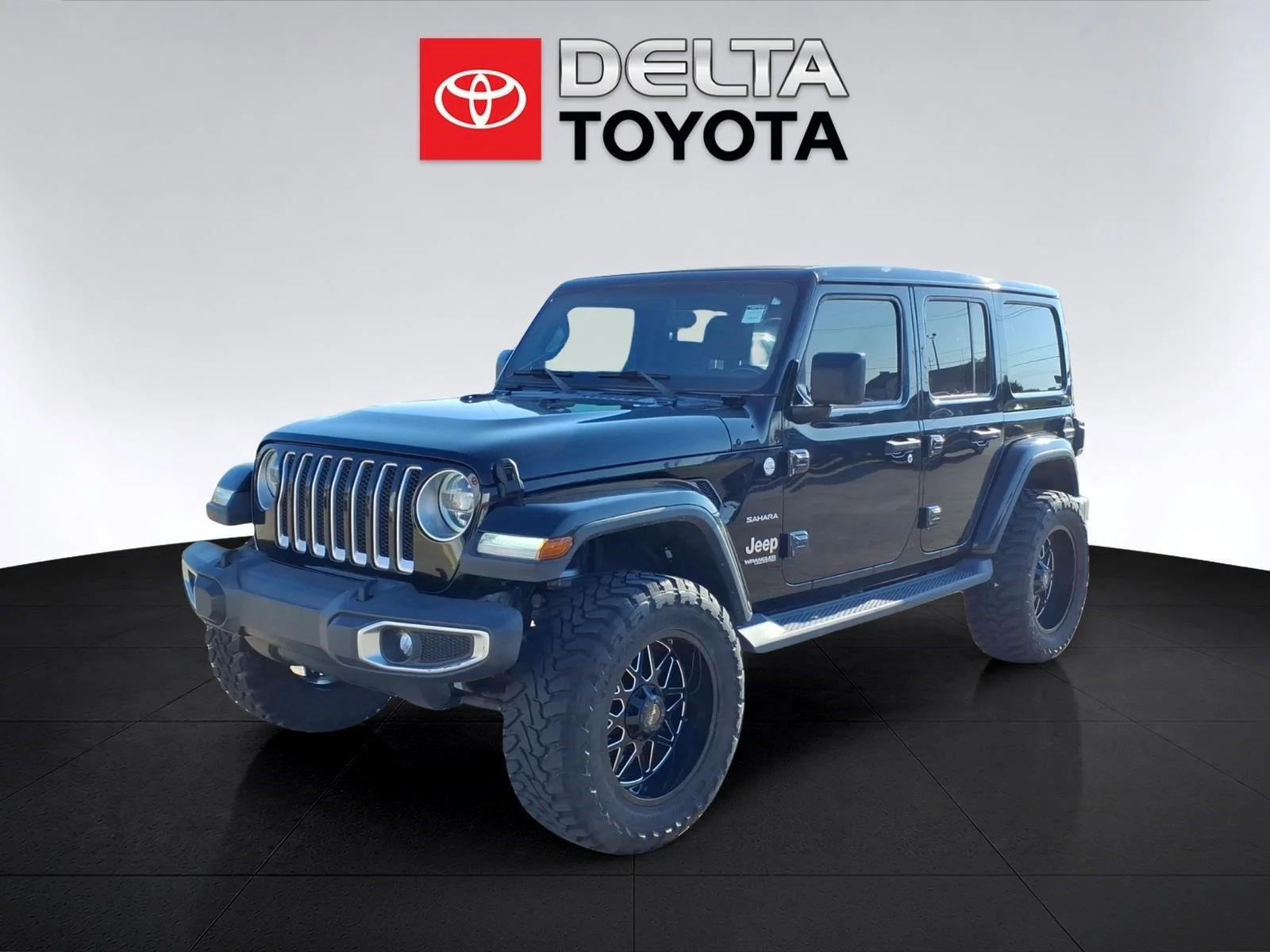 Used 2018 Black Jeep Sahara image 1