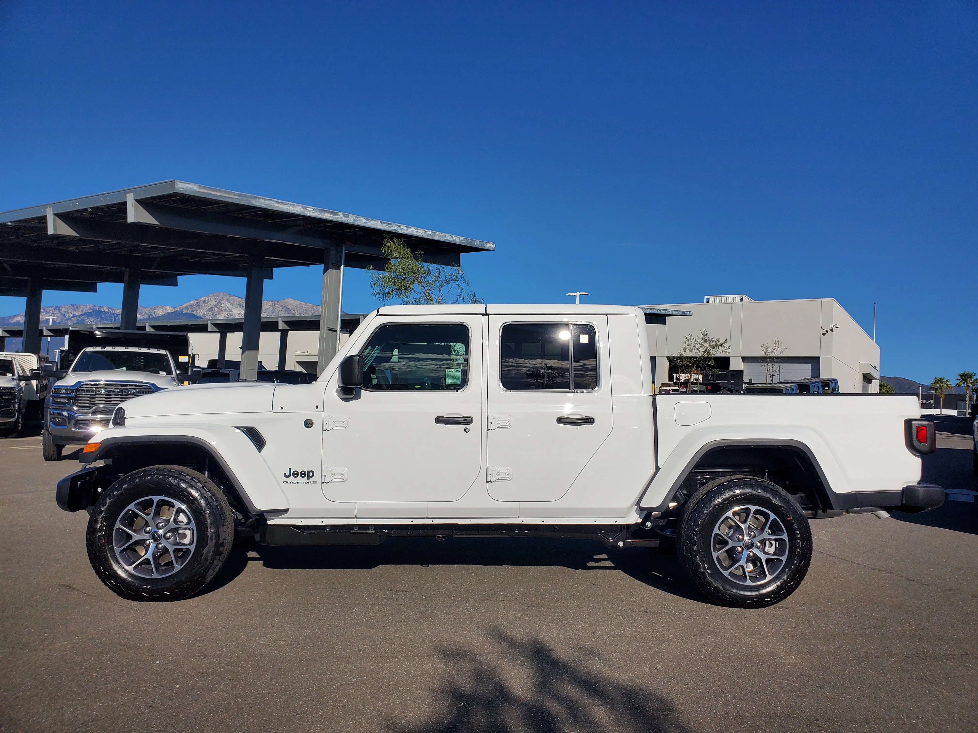 New 2026 Bright White Clear-Coat Exterior Paint Jeep Sport S image 2