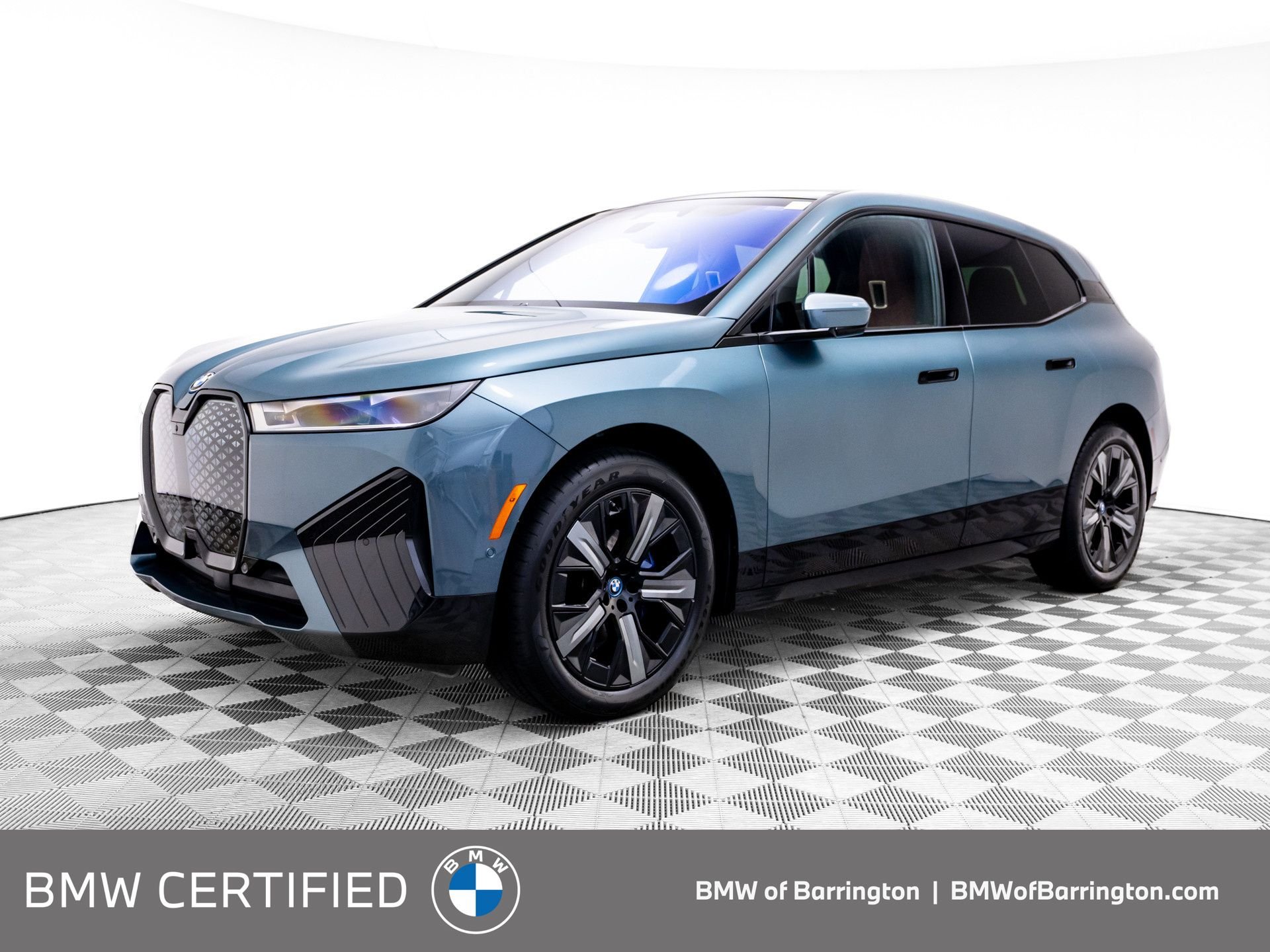 Used 2024 Blue BMW xDrive50 image 1