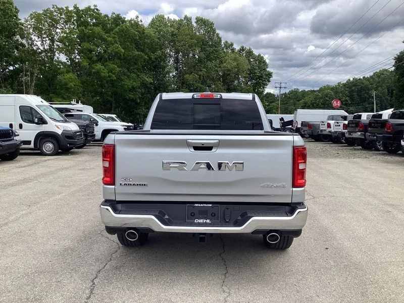 New 2026 Silver Zynith Exterior Paint RAM Laramie image 6