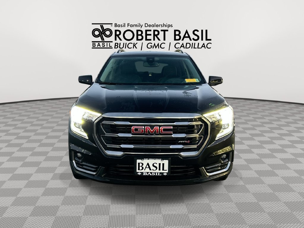 Used 2024 Ebony Twilight Metallic GMC AT4 image 3