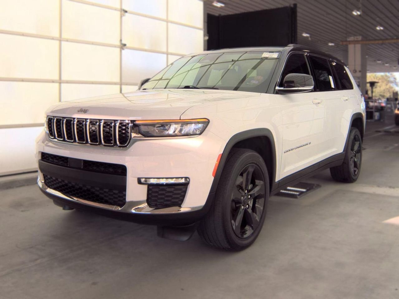 Used 2021 Bright White Clearcoat Jeep Limited 4x2 image 1