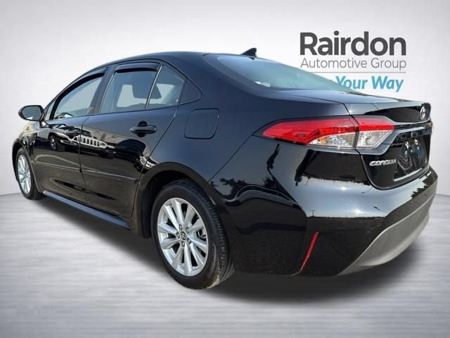 Used 2024 Midnight Black Metallic Toyota LE image 5
