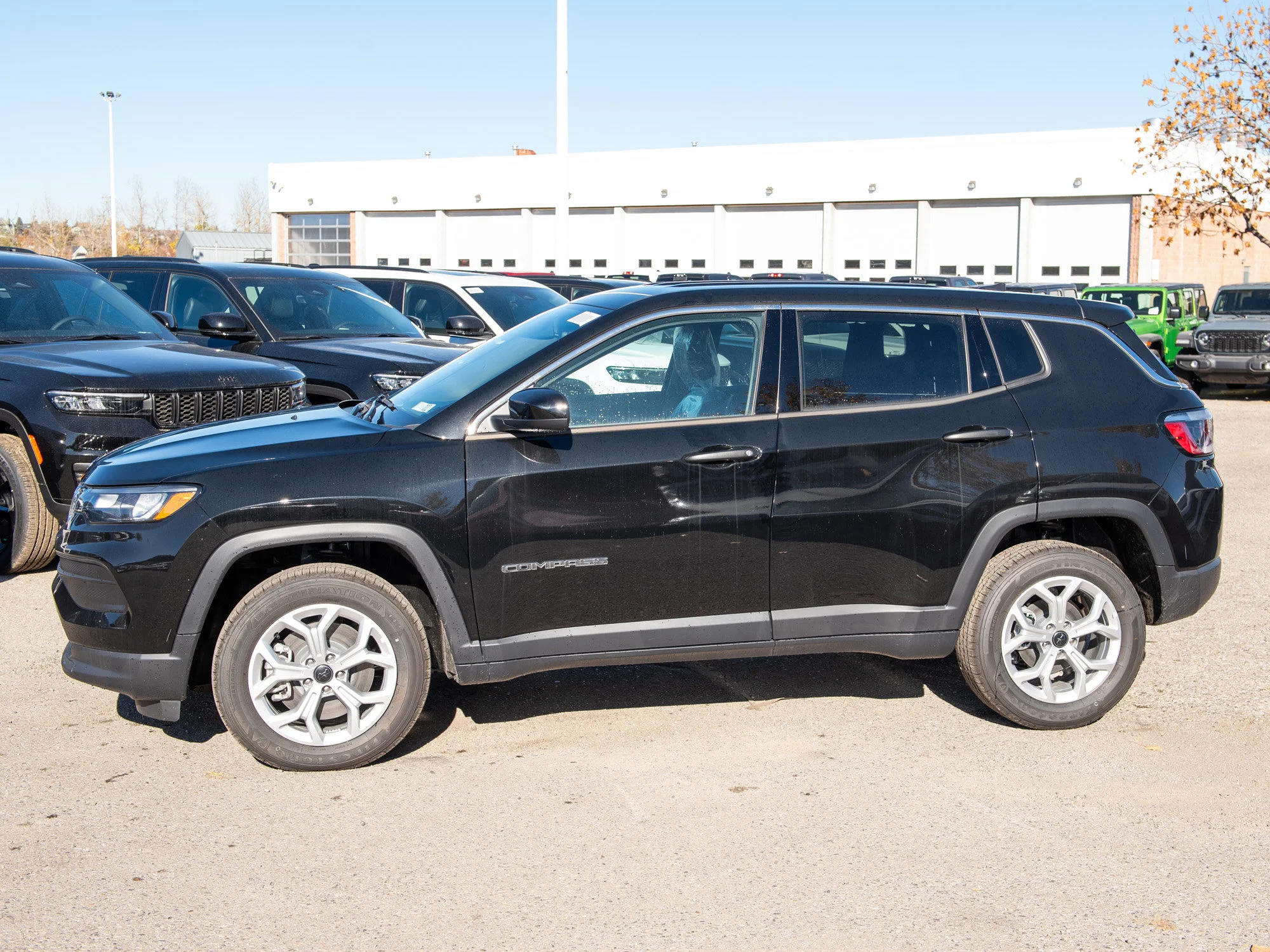 New 2026 Black Jeep Sport* image 2