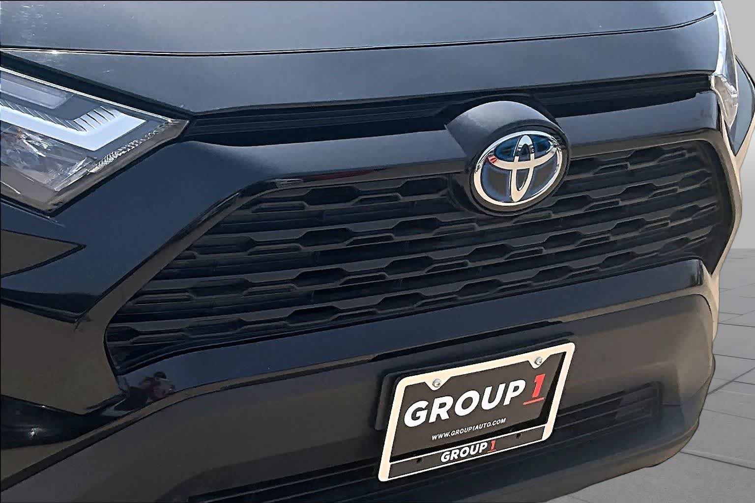 Used 2023 Midnight Black Metallic Toyota Hybrid LE image 20