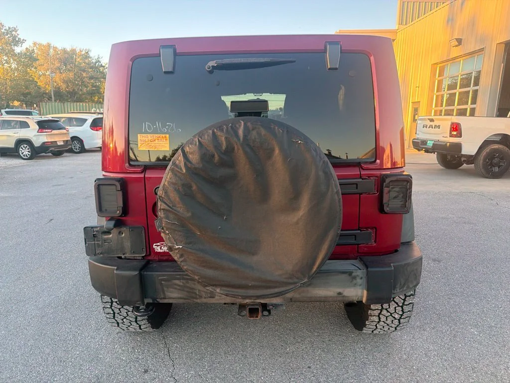 Used 2012 Red Jeep Unlimited Sport S image 6