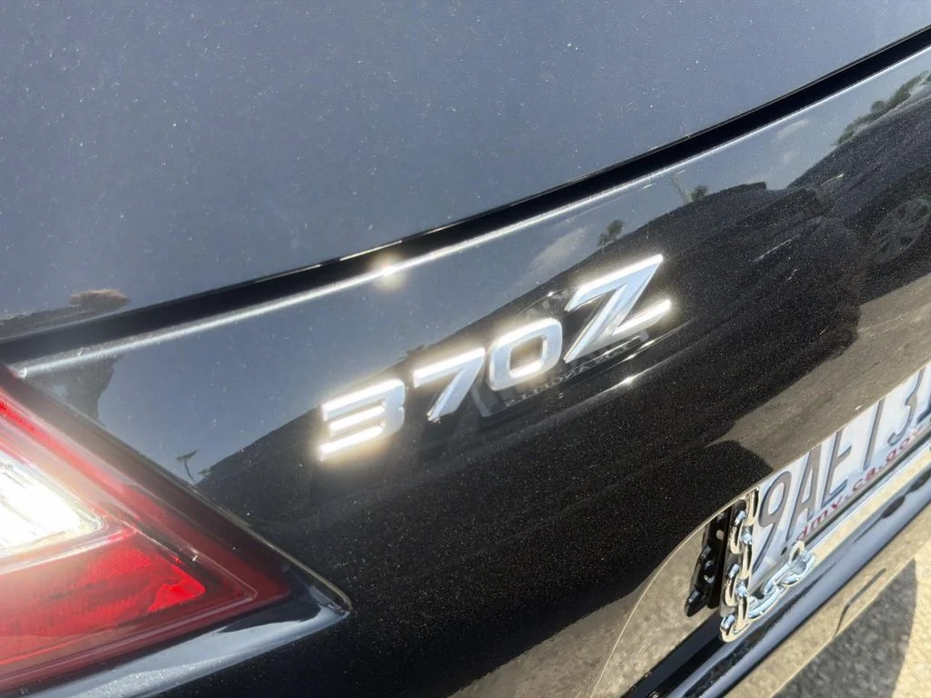 Used 2020 Magnetic Black Pearl Nissan Sport Touring image 6