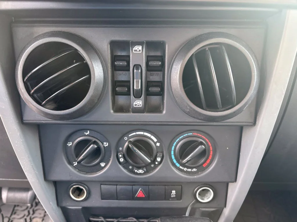 Used 2010 Orange Jeep Unlimited Sport image 14