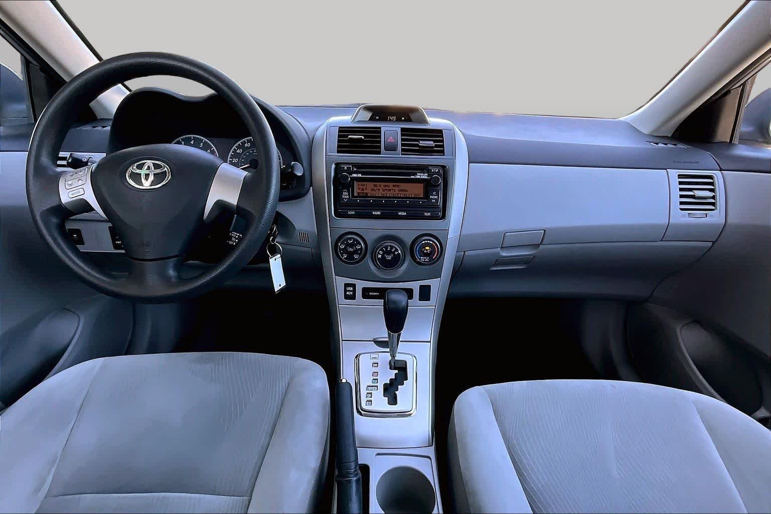 Used 2012 Classic Silver Metallic Toyota LE image 16